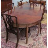 A pair of 19th century D end tables, extended and adapted to a dining table,