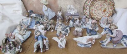 A collection of Lladro figures including New Playmates, Girls and Doll, Little Stowaway,