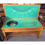 A Games Compendium table, of rectangular form, the reversible top with Black Jack table,