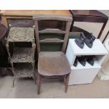 A brass three tier plant stand together with a chair, folding card table,