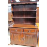 A Jaycee oak dresser, the planked rack with two shelves,