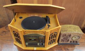 A Steepletone radio, together with a record player (Sold as seen,