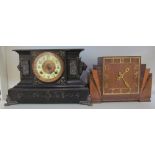 A black painted mantle clock together with an oak mantle clock