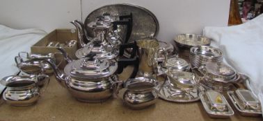 A quantity of electroplated wares including dishes, teapots, entree dish and cover,