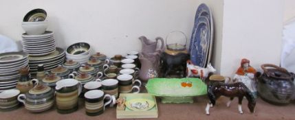 A Rumney pottery part dinner set together with graduated pottery jugs, Beswick Horses, cow creamer,