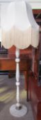 A Variegated marble standard lamp with a baluster column and circular base ***PLEASE NOTE THAT