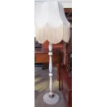 A Variegated marble standard lamp with a baluster column and circular base ***PLEASE NOTE THAT