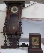 A Vienna regulator type wall clock together with a mantle clock