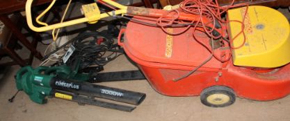 A Powerplus leaf blower together with a mower etc (Sold as seen,