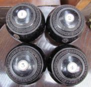 Four Taylor Rolph Co Ltd ebonised bowls