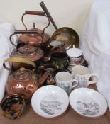 A set of four monochrome saucer dishes, possibly Swansea together with copper kettles,