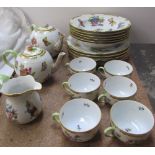 A Herend part dinner set comprising two teapots, six dinner plates,