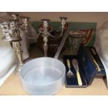 A pair of electroplated candelabra together with a cased carving set, cased fish servers, pan,