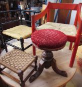 An ebonised bobbin turned corner chair with a pad upholstered seat together with a red painted