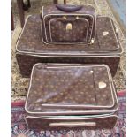 Three Pierre Cardin cases including a suitcase,