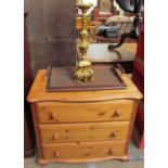 A modern pine chest of drawers together with a twin handled tray and a gilt table lamp