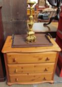 A modern pine chest of drawers together with a twin handled tray and a gilt table lamp