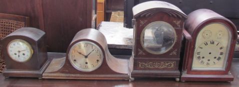 A 19th century mahogany clock case with brass inlay and ball feet together with an oak mantle clock