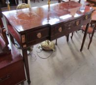 A 20th century mahogany side table on square tapering legs and spade feet together with a walnut