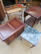 A bamboo hanging shelf unit together with an oak coffer,