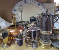 A Miners lamp together with an electroplated hot water pot, dressing table set,