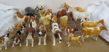 A Beswick cow together with Beswick horses, Goebel dogs, Beswick dog,