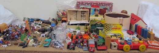 Assorted farmyard animals together with model cars, microscope, flatwares,