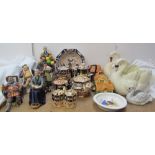 Various Royal Doulton figures including The Cup of Tea, The Foaming Quart, The Laird, Old King Cole,