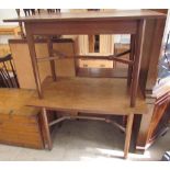 A pair of oak side tables with rectangular tops and frieze drawers on octagonal tapering legs