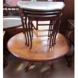 A Victorian walnut inlaid coffee table on a pedestal base together with a 20th century mahogany