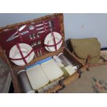 The Brexton Collection picnic basket with pottery and plastic fittings together with a fishing