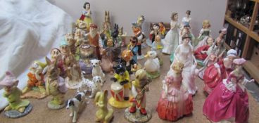 Assorted Royal Doulton figures of Ladies together with Beswick cat musicians,