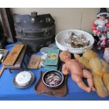 A teddy bear together with a doll, pottery basin, electroplated goblets, leather chest guard,
