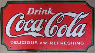 A Coca-Cola enamel sign together with assorted prints