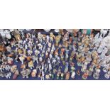 A large quantity of animal figures,