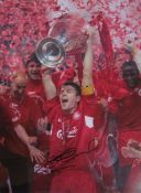 A framed signed Stephen Gerrard photographic print with A1 Sporting Memorabilia certificate,