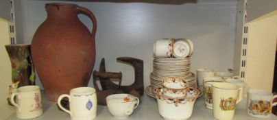 A terracotta jug together with commemorative mugs, part tea set.