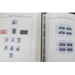 Four stamp albums containing modern European stamps