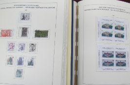 Four stamp albums containing modern European stamps