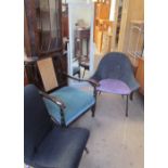 An upholstered chair with a bergère back together with a wicker chair,