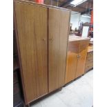 A modern two door wardrobe together with a walnut tallboy