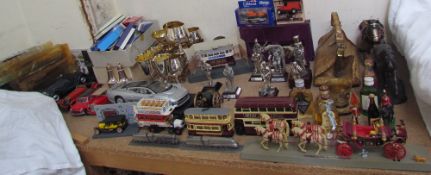 Minic ships together with model cars, Omnibuses, souvenir spoons, electroplated goblets,