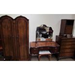 A 20th century mahogany wardrobe together with a mahogany dressing table, dressing stool,