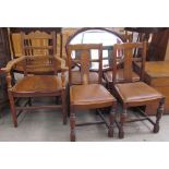 An oak elbow chair together with a set of four oak dining chairs and an oval wall mirror