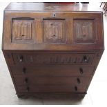 A 20th century oak bureau together with an oak gate leg dining table and a nest of three tables