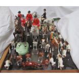 Beswick - a pair of Huntsman on bay horses together with another huntsman on a rearing horse,