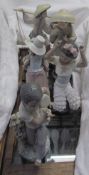 Five Lladro figures including a Chinese lady carrying fish,