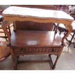 A 20th century oak side table with a frieze drawer and ring turned legs together with a mahogany