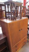 A 20th century oak tallboy together with two oak nests of three tables and a kitchen elbow chair