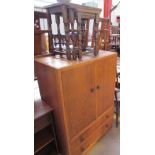A 20th century oak tallboy together with two oak nests of three tables and a kitchen elbow chair